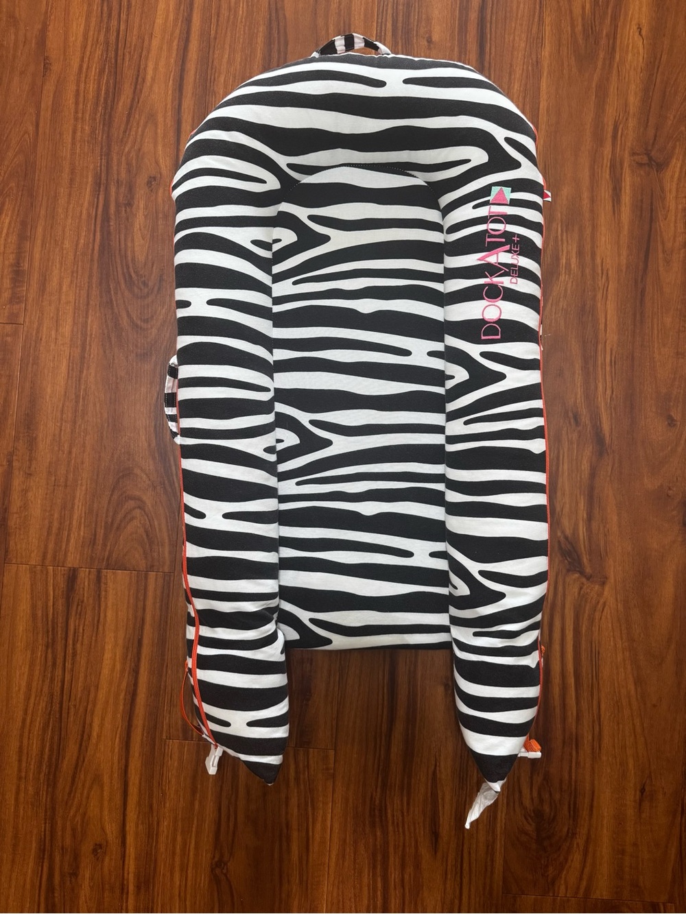 DockATot Deluxe+ with cover theme So Safari